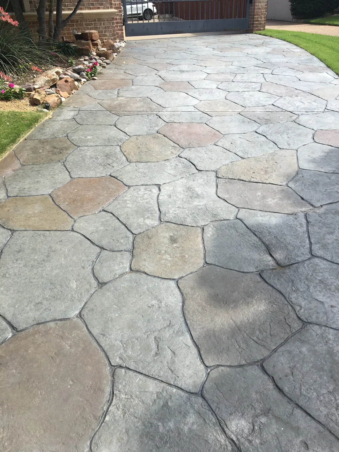 A stamped backyard transformation by Lucky&rsquo;s Concrete in Arlington